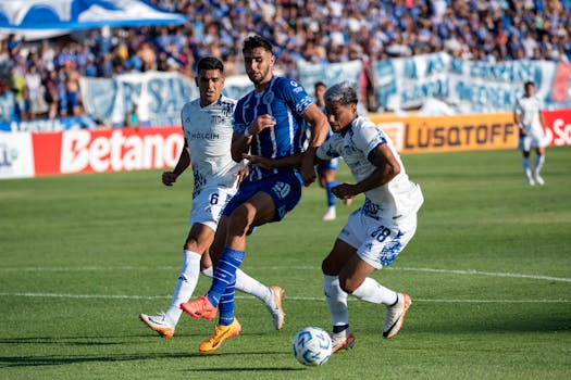 soccer team celebrating a goal